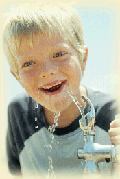 Boy at fountain