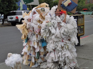 two people wrapped in plastic bags