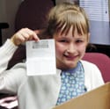 Girl holding prize