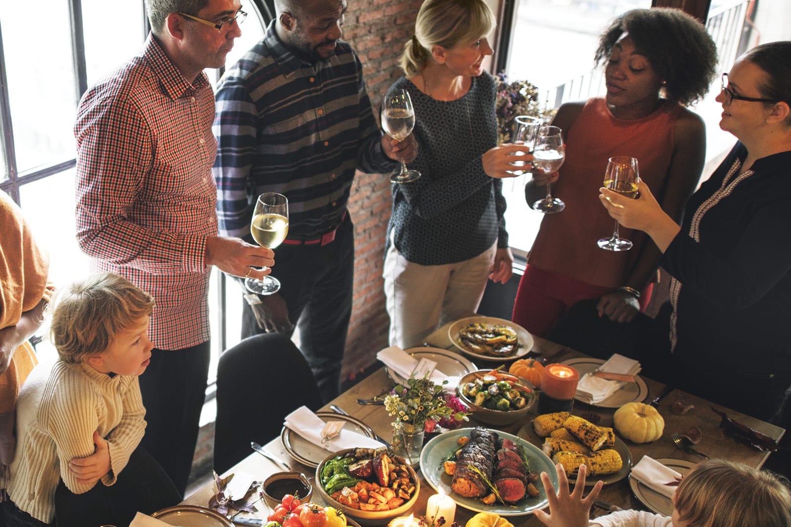 holiday meal diverse people