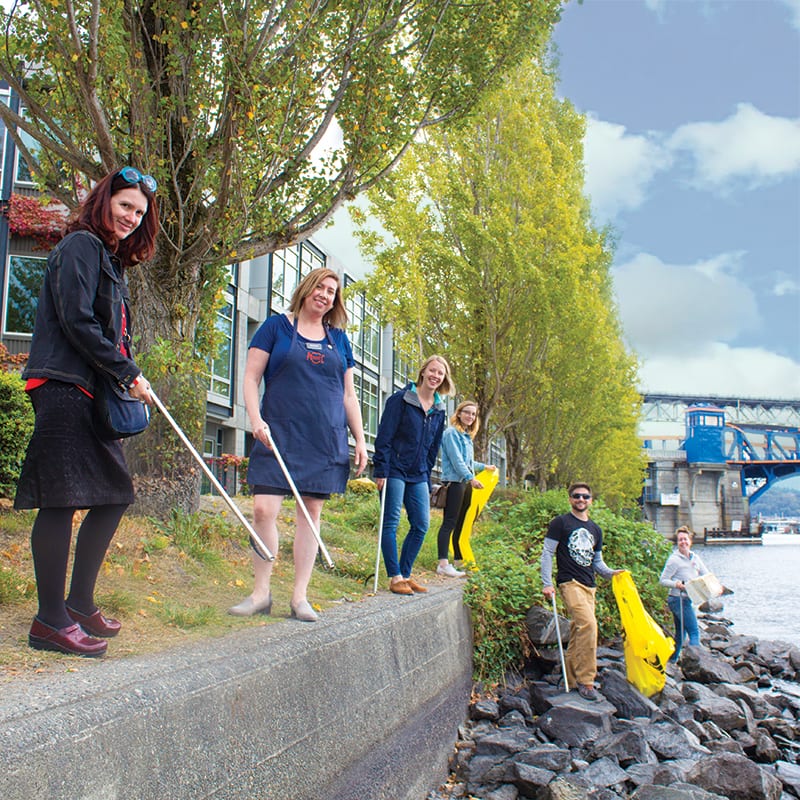 Fremont PCC and Puget Soundkeeper Alliance staff cleaning the Fremont canal.