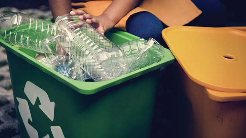 Recycling plastic bottles.