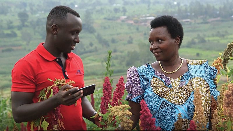 Cedric and His mother in the Quinoa fields in Rwanda