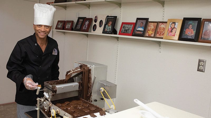 Herman Lanier making chocolates