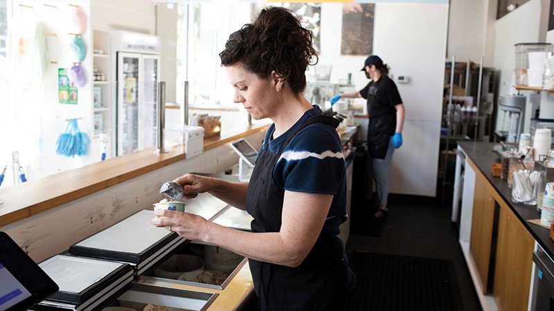 Molly Moon scooping ice cream