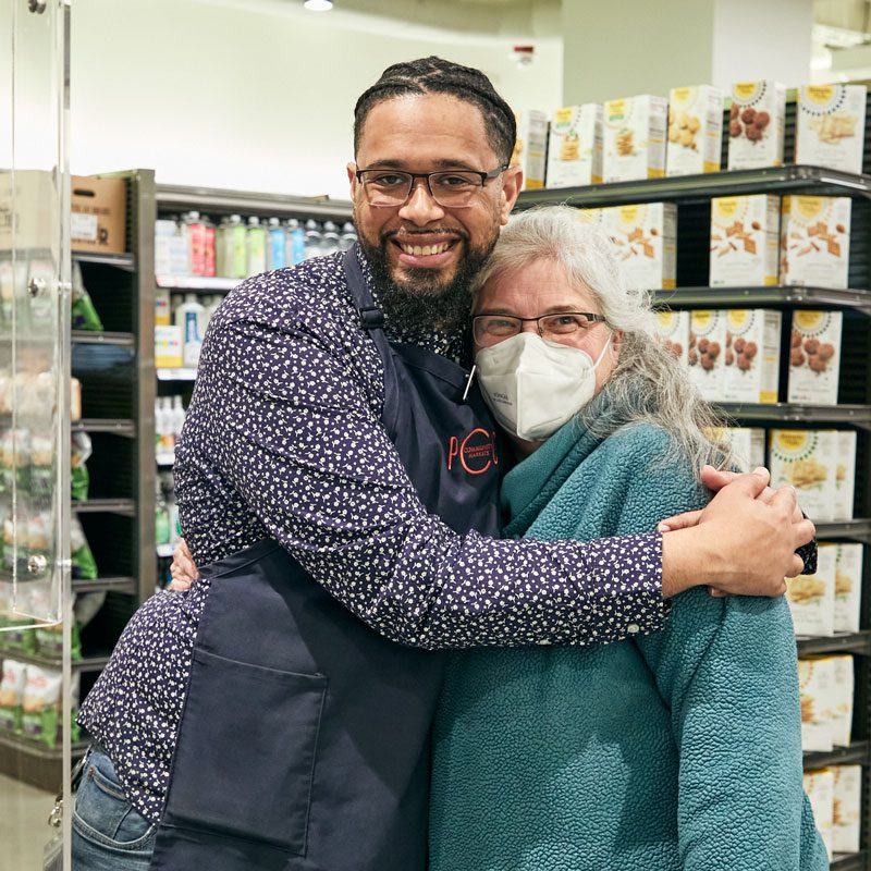 Steffan hugging customer
