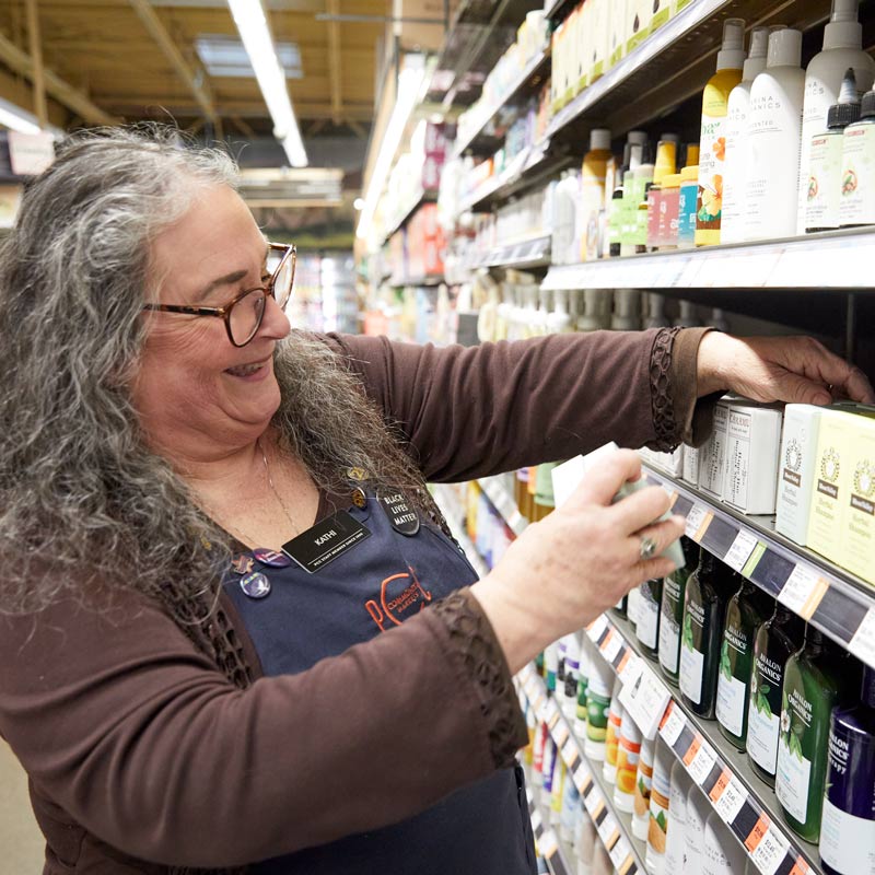 Kathi stocking shelves