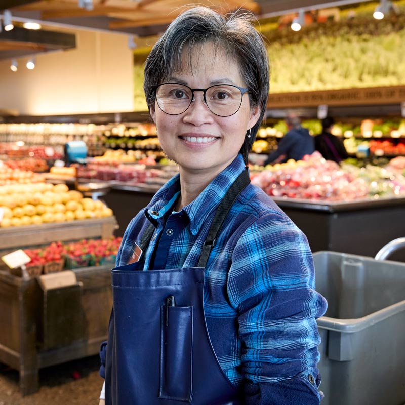 portrait of Thao in the produce department