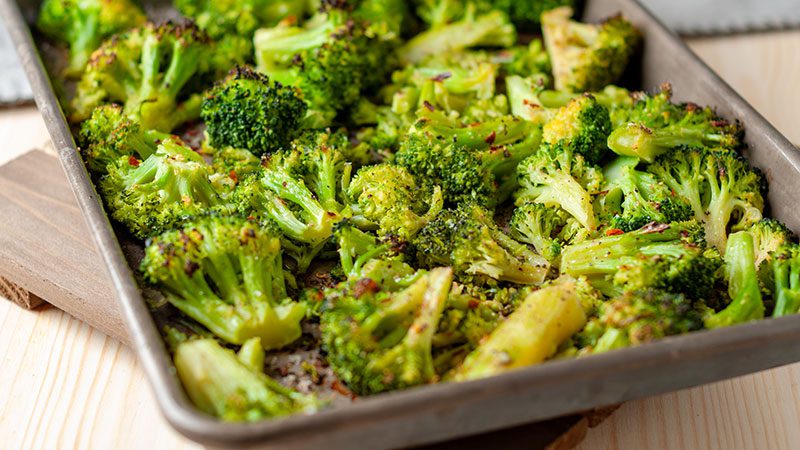 Frozen broccoli roasted on a baking sheet