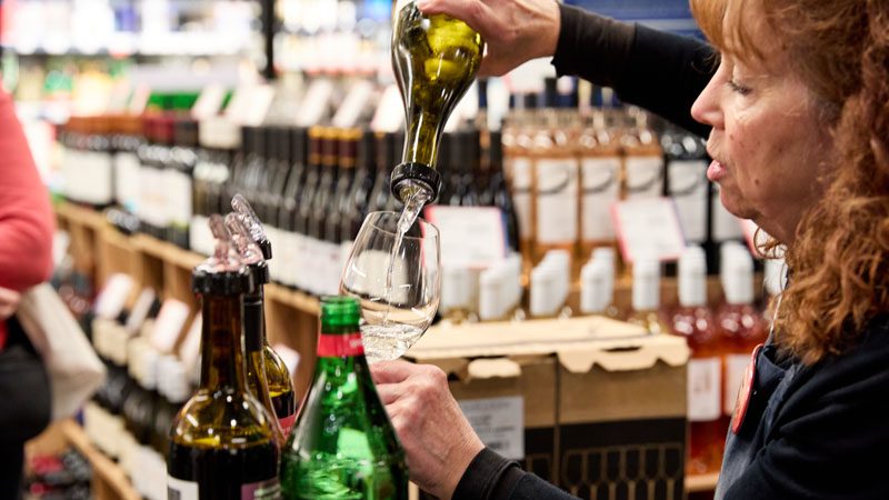Wine being poured for a tasting at PCC.