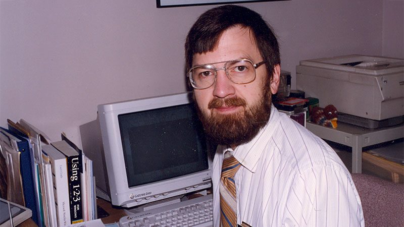 Randy Lee at this desk