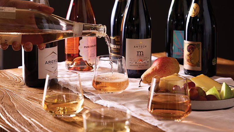 Sparkling wines being poured into glasses